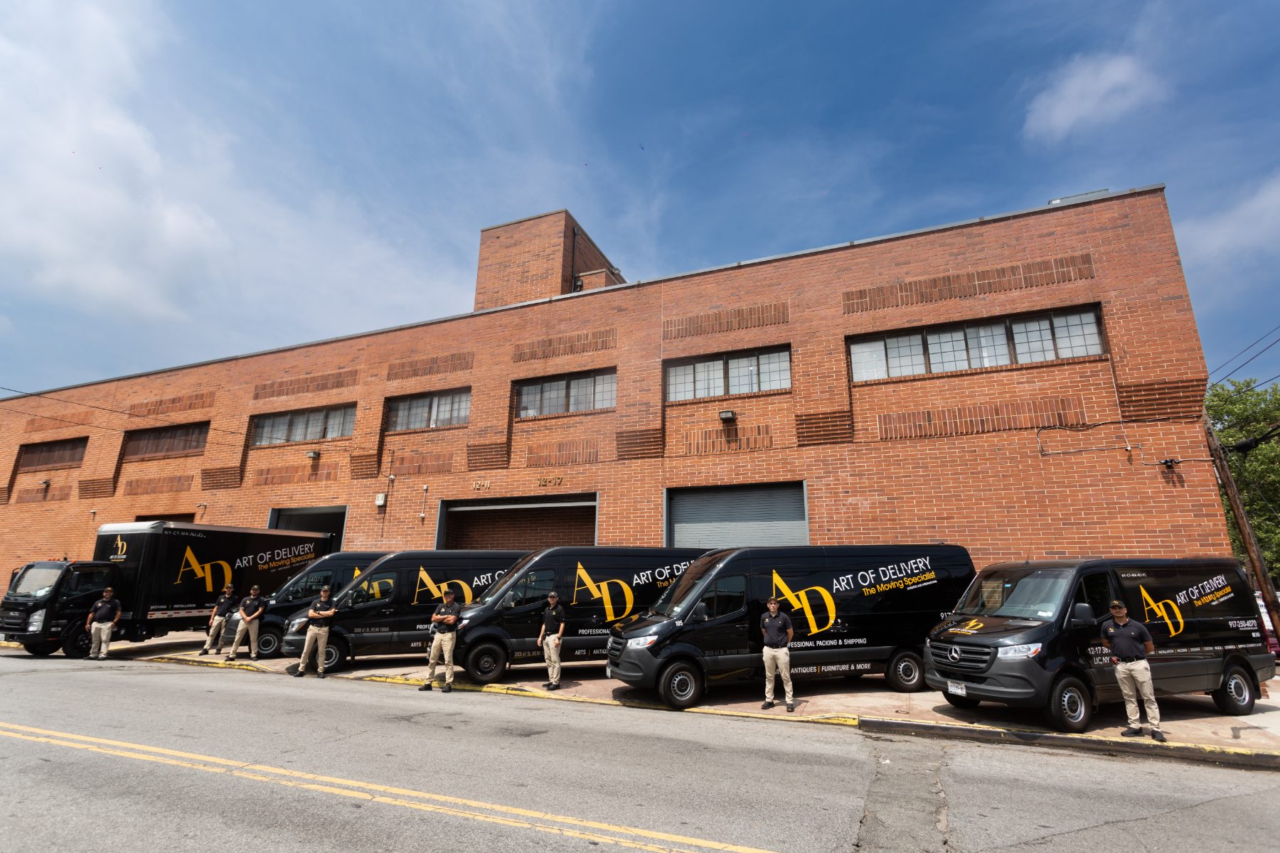 Art of Delivery fleet lined up outside the warehouse